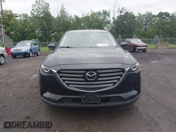 2020 Mazda CX-9 Touring with VIN JM3TCBCY5L0422262, listed as a IAAI auction lot 42456246 with 69,211 mi miles and . Bid and sale history available at DreamBid. Image 12.
