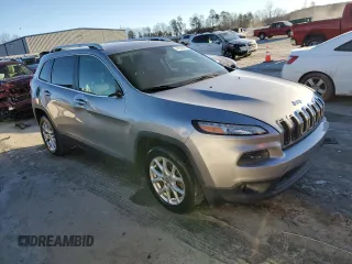 2014 Jeep Cherokee Latitude with VIN 1C4PJLCB5EW225528, listed as a Copart auction lot 41489995 with 172,391 mi miles and Salvage Title. Bid and sale history available at carsss.com. Image 4.