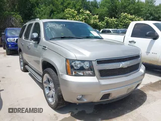2007 Chevrolet Tahoe LT z VIN 1GNFC13077R296537, wystawiony jako IAAI lot #42301211 z przebiegiem 210 110 mil mil oraz . Historia ofert i sprzedaży dostępna na DreamBid. Obrazek 1.
