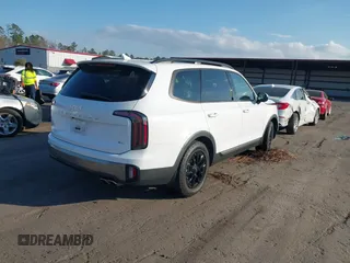 2023 Kia Telluride SX Prestige X-Pro with VIN 5XYP5DGC6PG351443, listed as a IAAI auction lot 41548694 with 32,665 mi miles and . Bid and sale history available at DreamBid. Image 4.