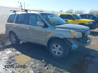 2007 Honda Pilot EX with VIN 2HKYF184X7H534943, listed as a IAAI auction lot 41818741 with 220,151 mi miles. Bid and sale history available at carsss.com. Image 1.