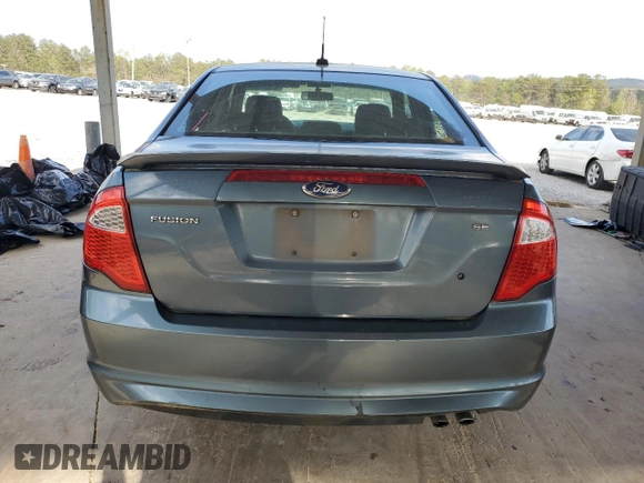 2012 Ford Fusion SE with VIN 3FAHP0HAXCR371611, listed as a Copart auction lot 51667085 with 145,571 mi miles and Salvage Title. Bid and sale history available at DreamBid. Image 6.