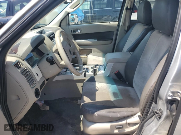2010 Mercury Mariner Premier with VIN 4M2CN8HG5AKJ02005, listed as a Copart auction lot 55655904 with 138,429 mi miles and Salvage Title. Bid and sale history available at carsss.com. Image 7.