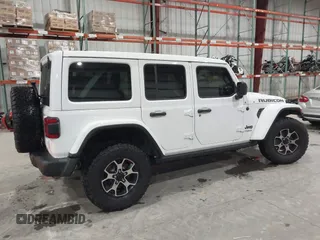 2021 Jeep Wrangler Unlimited Rubicon with VIN 1C4HJXFN2MW809904, listed as a IAAI auction lot 41567956 with 34,000 mi miles and . Bid and sale history available at DreamBid. Image 13.