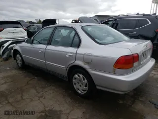 1997 Honda Civic EX with VIN 1HGEJ8647VL018949, listed as a Copart auction lot 72557904 with 162,531 mi miles and Salvage Title. Bid and sale history available at carsss.com. Image 2.