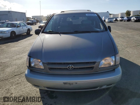 1999 Toyota Sienna LE with VIN 4T3ZF13C5XU144781, listed as a Copart auction lot 48932535 with 216,436 mi miles and Salvage Title. Bid and sale history available at carsss.com. Image 5.