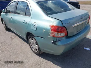 2008 Toyota Yaris with VIN JTDBT923384015057, listed as a IAAI auction lot 41879099 with 184,995 mi miles. Bid and sale history available at carsss.com. Image 6.