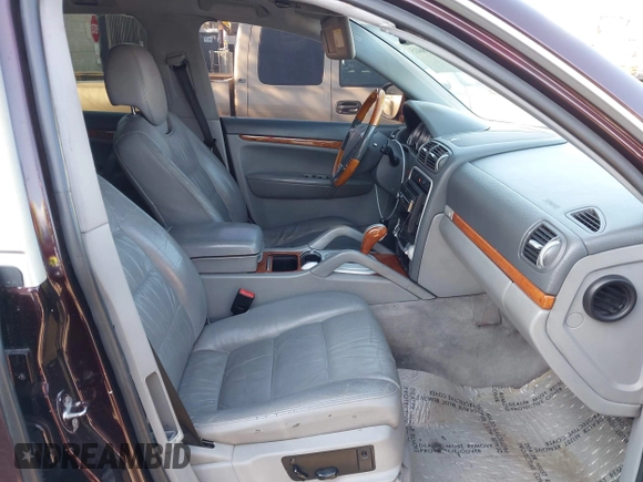2006 Porsche Cayenne S with VIN WP1AB29P56LA62851, listed as a IAAI auction lot 41986415 with 197,783 mi miles. Bid and sale history available at carsss.com. Image 5.