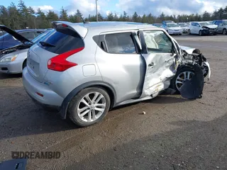 2014 Nissan Juke S with VIN JN8AF5MV8ET363145, listed as a IAAI auction lot 41210984 with 113,268 mi miles. Bid and sale history available at carsss.com. Image 4.