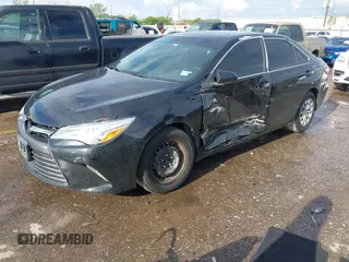 2016 Toyota Camry XLE with VIN 4T4BF1FK8GR563047, listed as a IAAI auction lot 41903643 with 151,560 mi miles and . Bid and sale history available at DreamBid. Image 17.