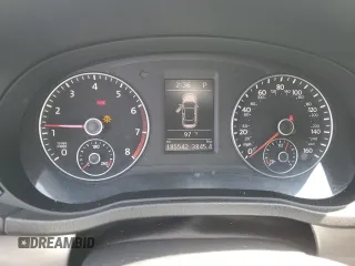 2014 Volkswagen Passat SE z VIN 1VWBT7A34EC061825, wystawiony jako Copart lot #59903665 z przebiegiem 185 542 mil mil oraz Szkoda całkowita • Salvage title. Historia ofert i sprzedaży dostępna na DreamBid. Obrazek 9.