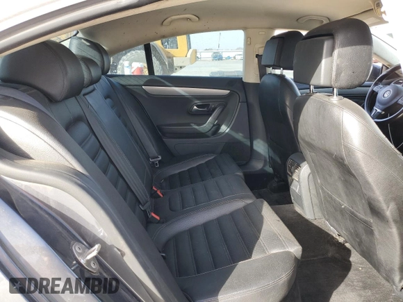 2013 Volkswagen CC Sport with VIN WVWBP7AN7DE563336, listed as a Copart auction lot 49719035 with 114,682 mi miles and Salvage Title. Bid and sale history available at carsss.com. Image 10.