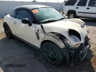 2013 MINI Coupe S z VIN WMWSX3C59DT466931, wystawiony jako Copart lot #75463804 z przebiegiem Nie podano mil oraz Szkody całkowita. Historia ofert i sprzedaży dostępna na DreamBid. Obrazek 4.