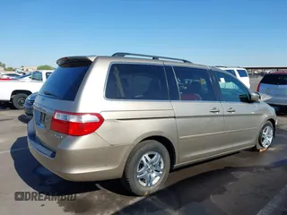 2005 Honda Odyssey EX-L with VIN 5FNRL38755B063203, listed as a IAAI auction lot 41073372 with Not provided miles and . Bid and sale history available at DreamBid. Image 4.