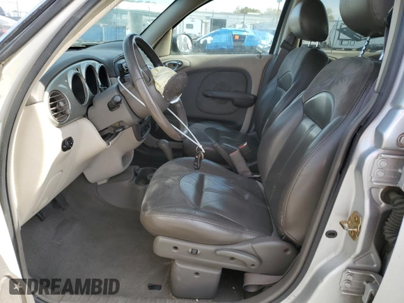 2001 Chrysler PT Cruiser with VIN 3C8FY4BB31T565483, listed as a Copart auction lot 79057824 with 216,188 mi miles and Salvage Title. Bid and sale history available at DreamBid. Image 7.