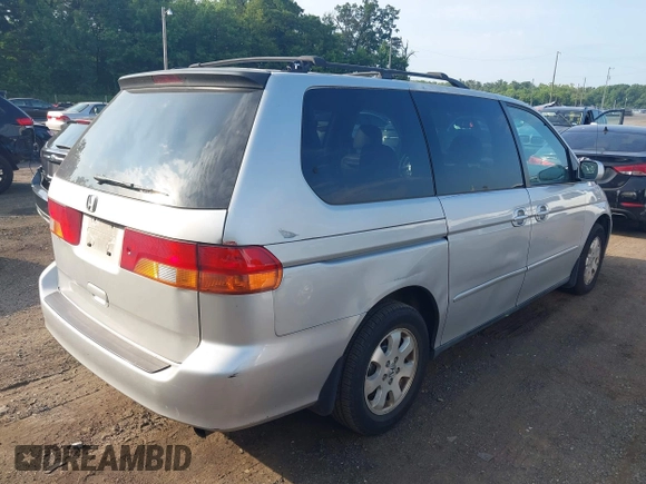 2003 Honda Odyssey EX-L with VIN 5FNRL18913B061340, listed as a IAAI auction lot 42633790 with 1,281,195 mi miles and . Bid and sale history available at DreamBid. Image 4.