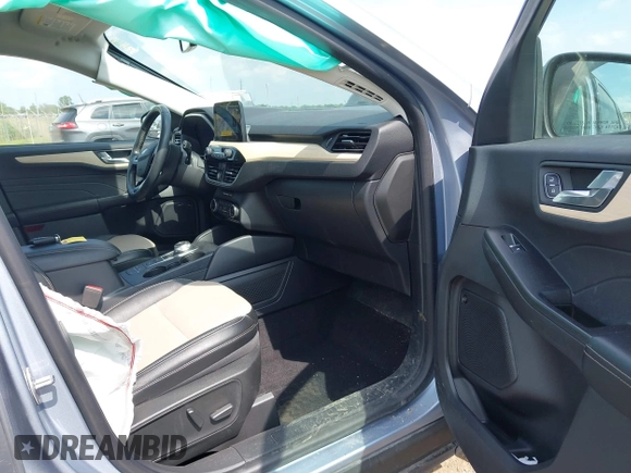 2022 Ford Escape Titanium with VIN 1FMCU9J94NUB57495, listed as a IAAI auction lot 42530044 with 27,075 mi miles and . Bid and sale history available at DreamBid. Image 5.