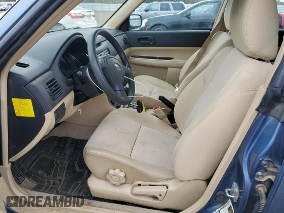 2007 Subaru Forester X with VIN JF1SG63697H721636, listed as a Copart auction lot 80301794 with 180,721 mi miles and Salvage Title. Bid and sale history available at carsss.com. Image 7.