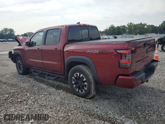 2022 Nissan Frontier Pro-4X with VIN 1N6ED1EK1NN601886, listed as a Copart auction lot 65182295 with 51,879 mi miles and Salvage title. Bid and sale history available at DreamBid. Image 2.