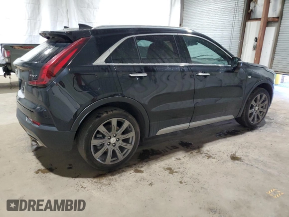 2021 Cadillac XT4 AWD Premium Luxury z VIN 1GYFZDR41MF001099, wystawiony jako Copart lot #48744655 z przebiegiem 57 633 mil mil oraz Czysty tytuł • Clean title. Historia ofert i sprzedaży dostępna na DreamBid. Obrazek 3.