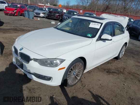 2014 BMW 3 Series 335i xDrive with VIN WBA3B9C52EJ466045, listed as a IAAI auction lot 41281384 with 136,329 mi miles. Bid and sale history available at carsss.com. Image 2.