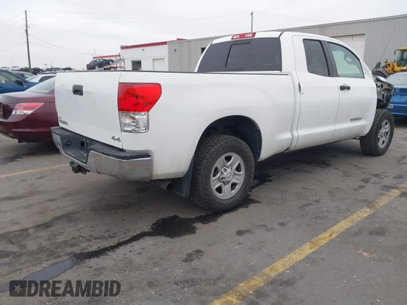 2012 Toyota Tundra z VIN 5TFUM5F11CX039386, wystawiony jako IAAI lot #41472576 z przebiegiem 213 295 mil mil oraz . Historia ofert i sprzedaży dostępna na DreamBid. Obrazek 4.