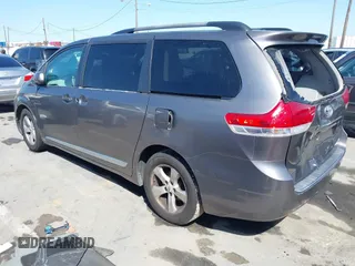 2012 Toyota Sienna LE AAS with VIN 5TDKK3DC9CS184722, listed as a IAAI auction lot 41942991 with 227,783 mi miles. Bid and sale history available at carsss.com. Image 3.