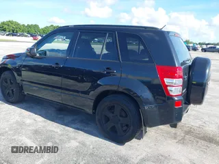 2006 Suzuki Grand Vitara Luxury z VIN JS3TD947664104590, wystawiony jako IAAI lot #42798282 z przebiegiem 146 725 mil mil oraz . Historia ofert i sprzedaży dostępna na DreamBid. Obrazek 3.