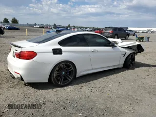 2015 BMW M4 z VIN WBS3R9C50FK334663, wystawiony jako Copart lot #59012605 z przebiegiem 69 749 mil mil oraz Szkoda całkowita • Salvage title. Historia ofert i sprzedaży dostępna na DreamBid. Obrazek 3.