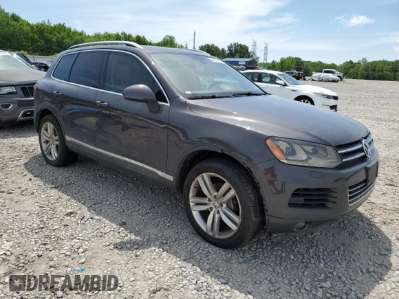 2013 Volkswagen Touareg Lux with VIN WVGEF9BP8DD002947, listed as a Copart auction lot 52590164 with 144,831 mi miles and Salvage Title. Bid and sale history available at DreamBid. Image 4.