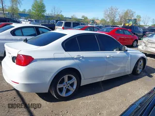 2015 BMW 3 Series 320i with VIN WBA3B1G57FNT02019, listed as a IAAI auction lot 42128277 with 218,621 mi miles and . Bid and sale history available at DreamBid. Image 14.