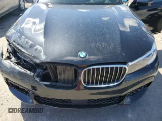 2017 BMW 7 Series 740e xDrive iPerformance with VIN WBA7J2C33HG497980, listed as a Copart auction lot 50244384 with 115,728 mi miles. Bid and sale history available at carsss.com. Image 11.