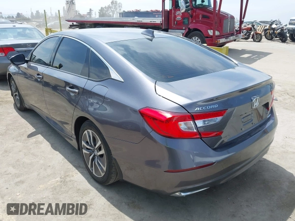 2020 Honda Accord with VIN 1HGCV3F11LA015901, listed as a IAAI auction lot 42022659 with 131,865 mi miles and . Bid and sale history available at DreamBid. Image 3.