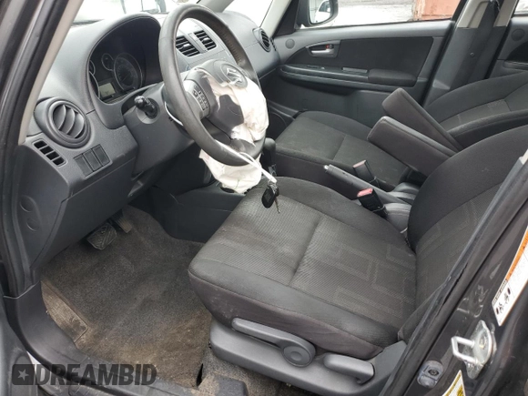 2011 Suzuki SX4 Crossover with VIN JS2YB5A30B6302560, listed as a Copart auction lot 66270184 with 137,913 mi miles and Salvage Title. Bid and sale history available at carsss.com. Image 7.