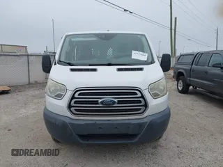 2016 Ford Transit Cargo z VIN 1FTYR1ZM3GKB36643, wystawiony jako IAAI lot #41127604 z przebiegiem 182 845 mil mil oraz . Historia ofert i sprzedaży dostępna na DreamBid. Obrazek 12.