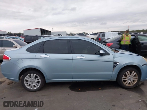 2008 Ford Focus SE with VIN 1FAHP35N78W270569, listed as a IAAI auction lot 38518647 with 173,674 mi miles. Bid and sale history available at carsss.com. Image 13.