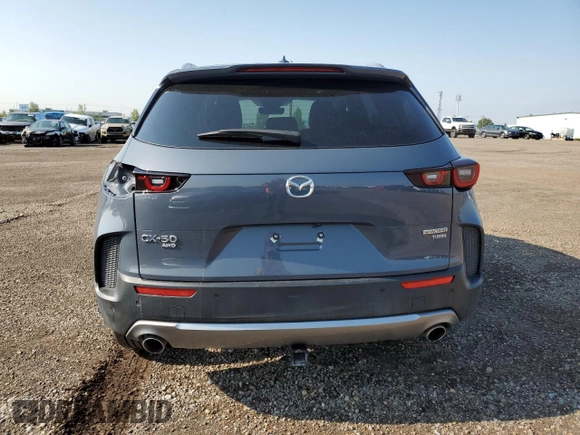 2024 Mazda CX-50 Premium with VIN 7MMVABDY1RN222772, listed as a Copart auction lot 61792465 with 4,875 mi miles and Salvage title. Bid and sale history available at DreamBid. Image 6.