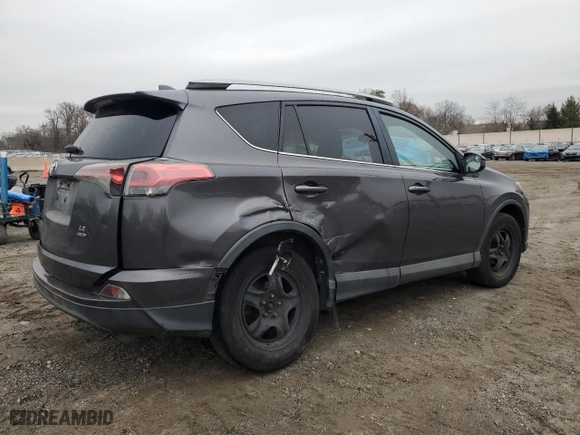 2017 Toyota RAV4 LE with VIN 2T3BFREV3HW635205, listed as a Copart auction lot 85606904 with 321,776 mi miles and Salvage Title. Bid and sale history available at carsss.com. Image 3.