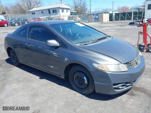 2010 Honda Civic Cpe LX with VIN 2HGFG1B63AH535237, listed as a IAAI auction lot 42070132 with 190,944 mi miles. Bid and sale history available at carsss.com. Image 1.