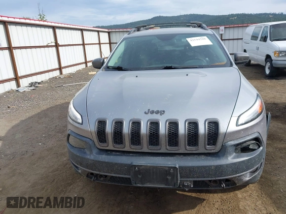 2015 Jeep Cherokee Trailhawk with VIN 1C4PJMBS0FW522182, listed as a IAAI auction lot 42544508 with 74,910 mi miles and . Bid and sale history available at DreamBid. Image 12.