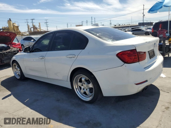 2014 BMW 3 Series 328i with VIN WBA3C1C56EK108374, listed as a Copart auction lot 52902485 with 136,407 mi miles and Salvage Title. Bid and sale history available at carsss.com. Image 2.