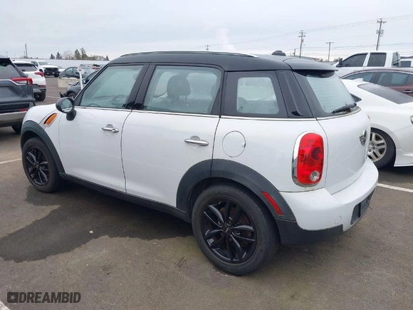 2011 MINI Cooper Countryman with VIN WMWZB3C54BWM01011, listed as a IAAI auction lot 41809669 with 1 mi miles. Bid and sale history available at carsss.com. Image 3.