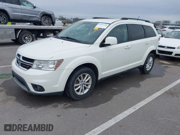 2013 Dodge Journey SXT with VIN 3C4PDCBG9DT564303, listed as a IAAI auction lot 41954764 with 132,125 mi miles. Bid and sale history available at carsss.com. Image 18.