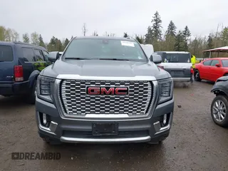 2022 GMC Yukon XL Denali with VIN 1GKS2JKL1NR208671, listed as a IAAI auction lot 39140703 with 28,235 mi miles and . Bid and sale history available at carsss.com. Image 12.