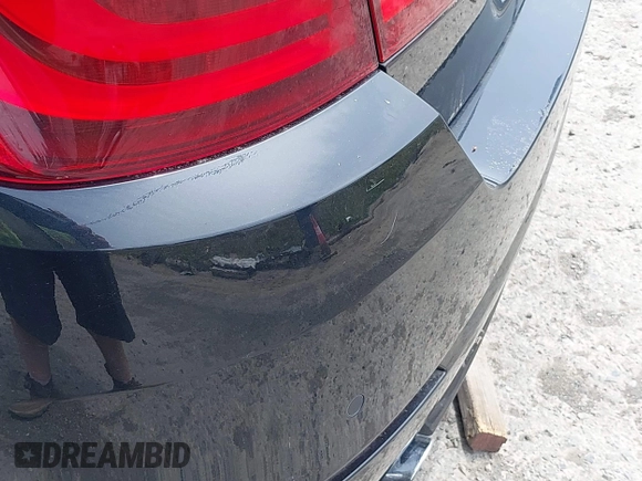 2013 BMW 5 Series 528i xDrive with VIN WBAXH5C59DDW14522, listed as a IAAI auction lot 42580923 with 106,400 mi miles and . Bid and sale history available at DreamBid. Image 6.