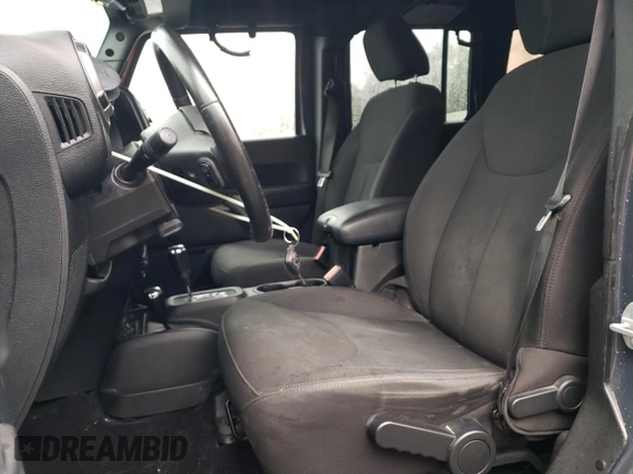 2016 Jeep Wrangler Unlimited Sport with VIN 1C4BJWDG2GL305086, listed as a Copart auction lot 48212105 with 113,001 mi miles and Salvage Title. Bid and sale history available at DreamBid. Image 7.