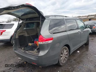 2013 Toyota Sienna XLE with VIN 5TDDK3DC7DS068591, listed as a IAAI auction lot 41483280 with 197,599 mi miles and . Bid and sale history available at DreamBid. Image 4.
