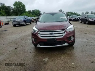 2018 Ford Escape Titanium z VIN 1FMCU0J93JUA70449, wystawiony jako Copart lot #59303245 z przebiegiem 165 907 mil mil oraz Szkoda całkowita • Salvage title. Historia ofert i sprzedaży dostępna na DreamBid. Obrazek 13.