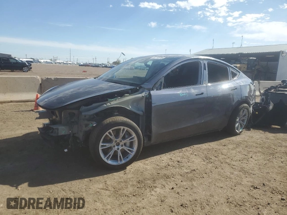 2023 Tesla Model Y Long Range z VIN 7SAYGDEE7PF965446, wystawiony jako Copart lot #54710375 z przebiegiem 23 807 mil mil oraz Szkoda całkowita • Salvage title. Historia ofert i sprzedaży dostępna na DreamBid. Obrazek 1.