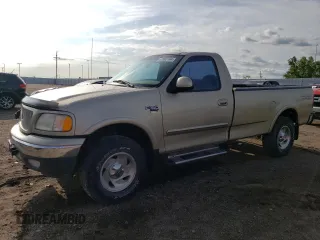 2000 Ford F-150 XL with VIN 1FTRF18L9YKA95457, listed as a Copart auction lot 67083164 with 97,988 mi miles and Salvage title. Bid and sale history available at DreamBid. Image 1.